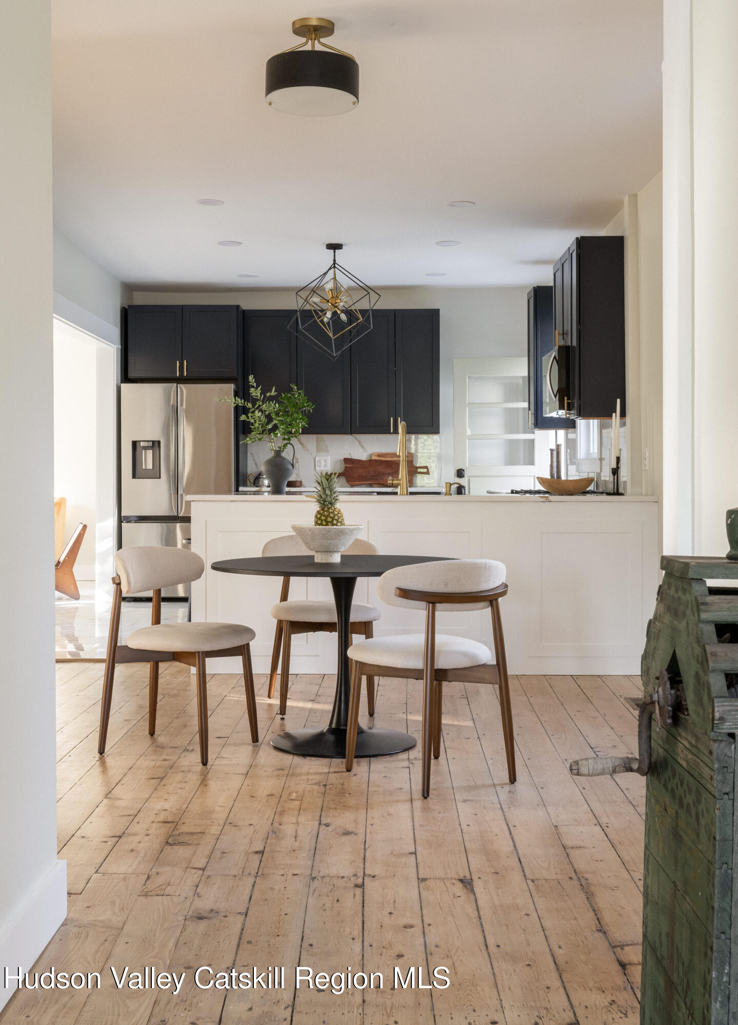 2859 Atlantic Avenue Hudson, NY 12534 - Photo 7 of 32 a view of a dining room with furniture