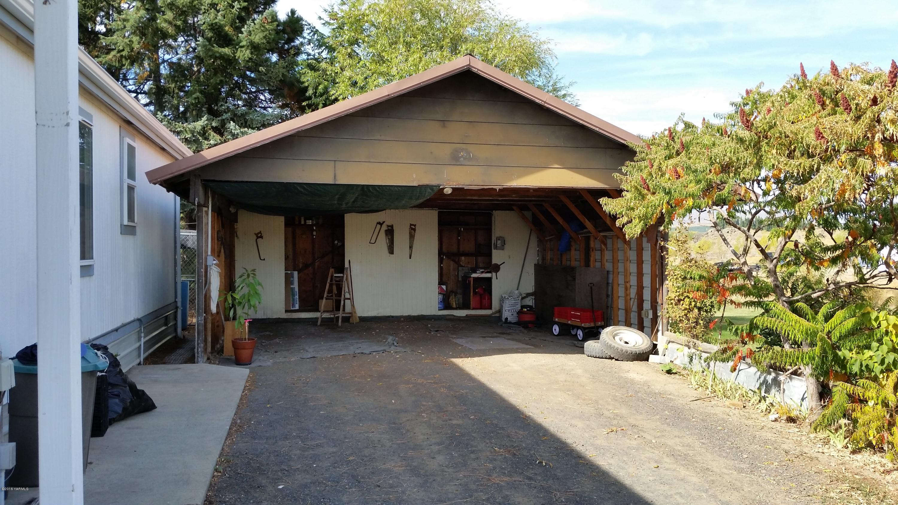 2211 Rosenkranz Road Tieton, WA 98947 - Photo 2 of 29 a view of a house with a yard
