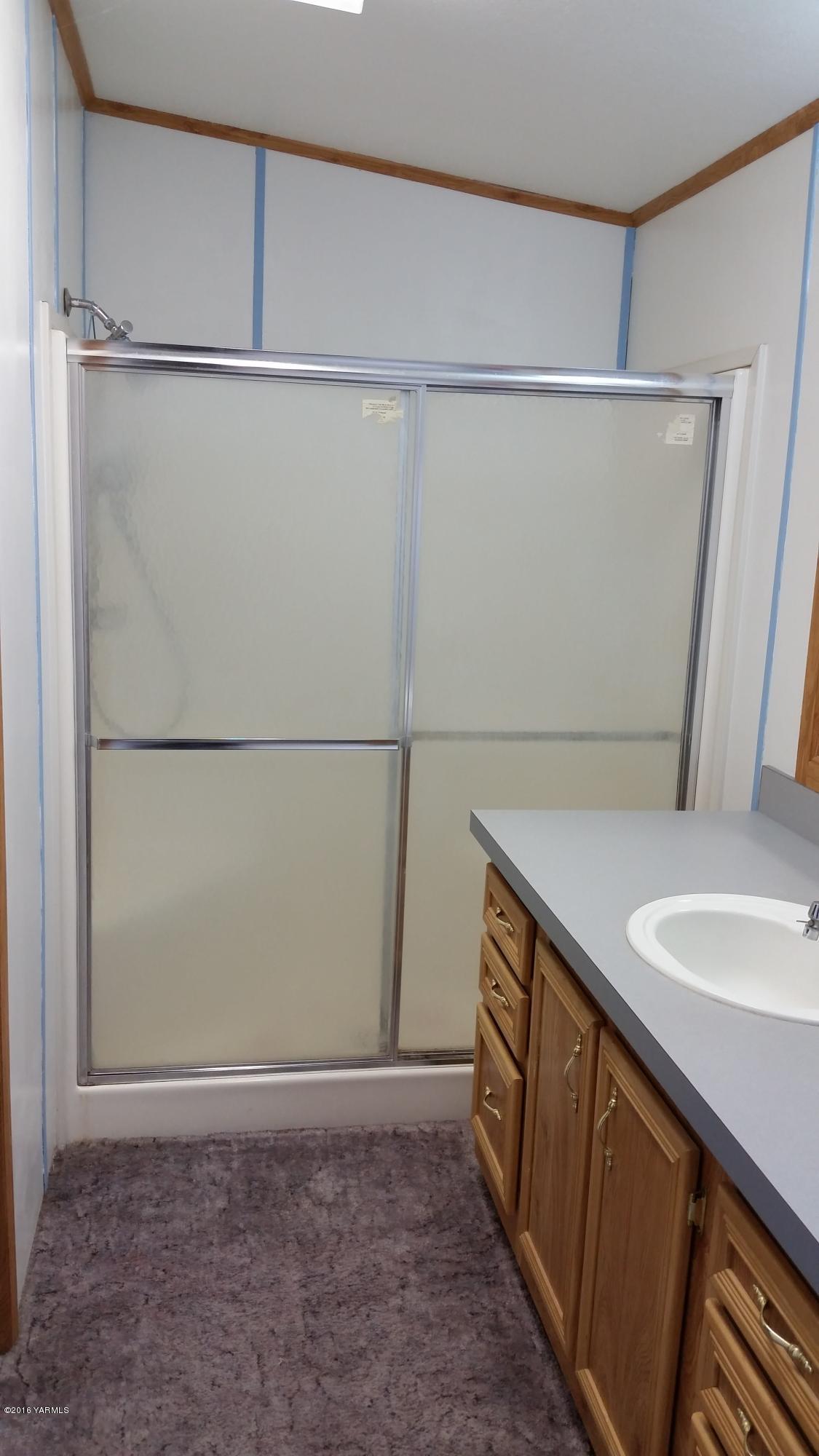 2211 Rosenkranz Road Tieton, WA 98947 - Photo 13 of 29 a bathroom with a shower and a sink