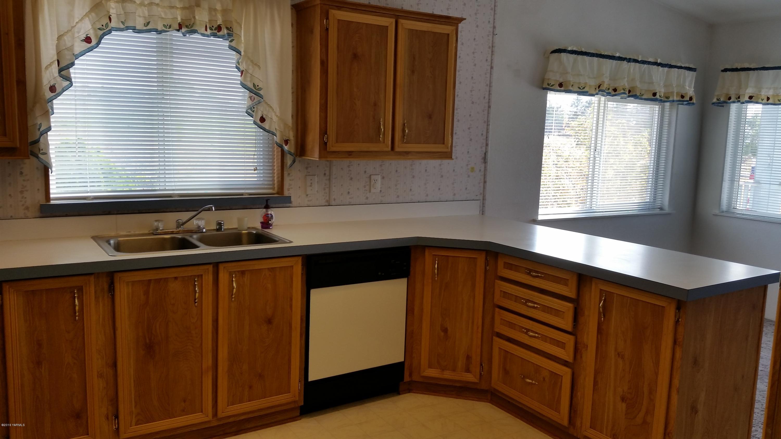 2211 Rosenkranz Road Tieton, WA 98947 - Photo 26 of 29 a kitchen with a sink and a window