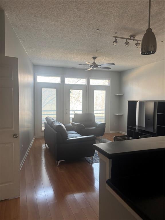 400 17th Street Northwest, Unit 1247 Atlanta, GA 30363 - Photo 3 of 8 a living room with furniture and a flat screen tv