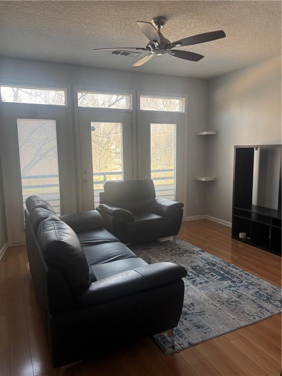 400 17th Street Northwest, Unit 1247 Atlanta, GA 30363 - Photo 4 of 8 a living room with furniture and a flat screen tv