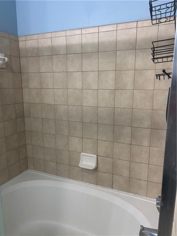 400 17th Street Northwest, Unit 1247 Atlanta, GA 30363 - Photo 6 of 8 a bathroom with a shower