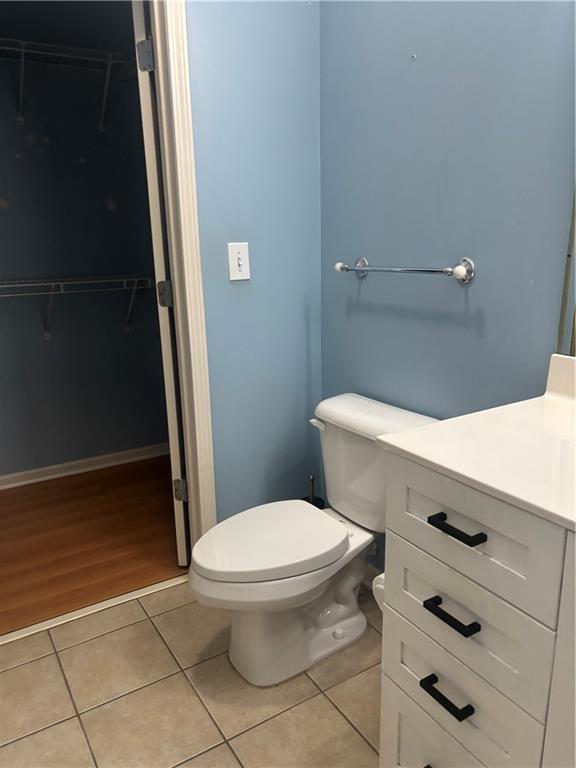400 17th Street Northwest, Unit 1247 Atlanta, GA 30363 - Photo 7 of 8 a bathroom with a toilet and a shower