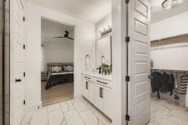 a kitchen with cabinets and a stove top oven