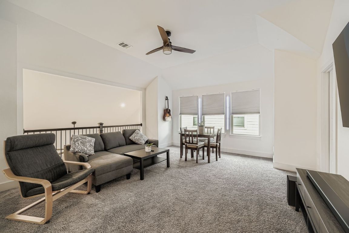 324 Clear Frk Loop Liberty Hill, TX 78642 - Photo 23 of 28 a living room with furniture and a window
