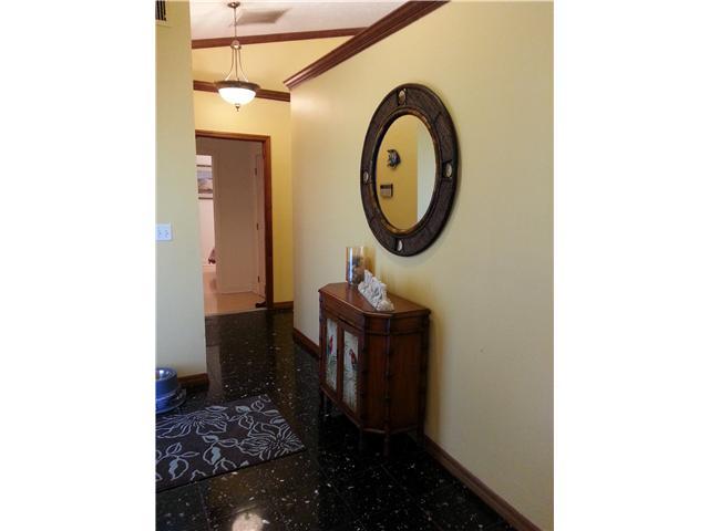 12757 Sandy Run Road Jupiter, FL 33478 - Photo 19 of 25 a bathroom with a sink and a mirror