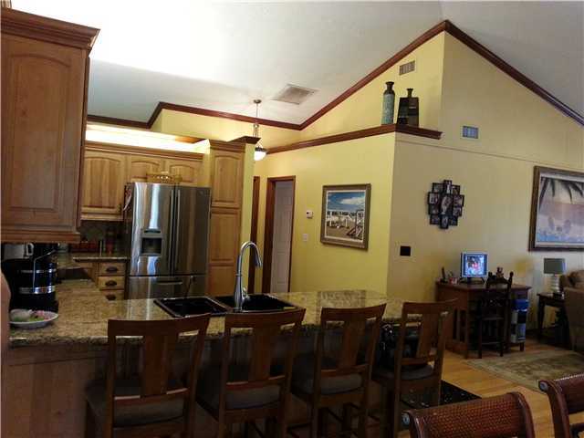 12757 Sandy Run Road Jupiter, FL 33478 - Photo 4 of 25 a view of a dining room with furniture