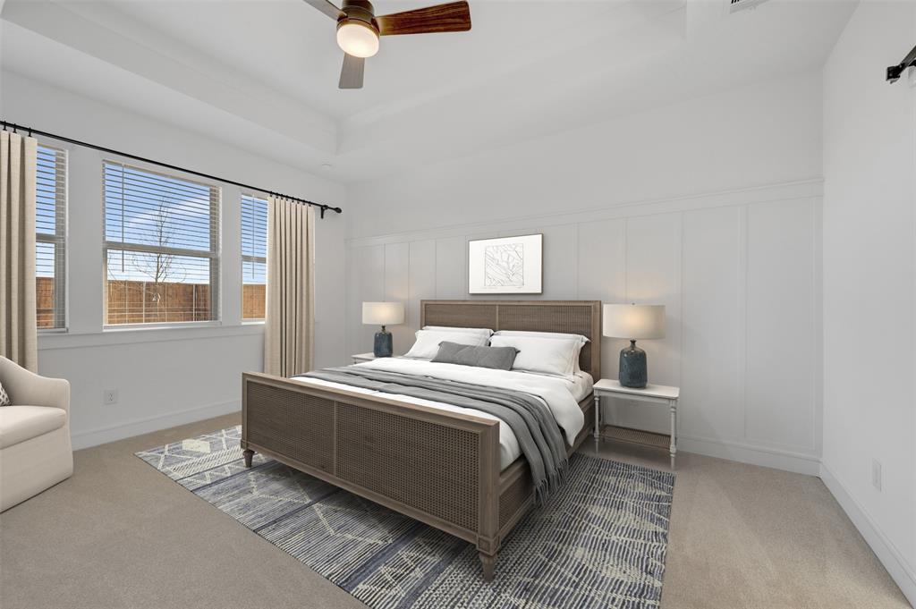 1014 Butterfly Lane Justin, TX 76247 - Photo 12 of 40 a bedroom with a bed lamp closet and window