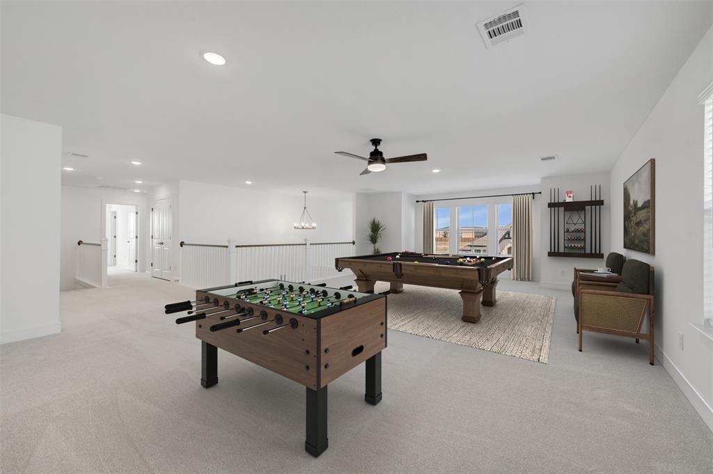1014 Butterfly Lane Justin, TX 76247 - Photo 20 of 40 a living room with furniture and a table