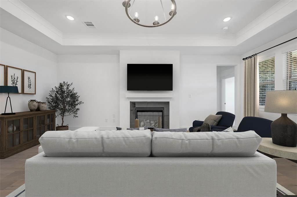 1014 Butterfly Lane Justin, TX 76247 - Photo 6 of 40 a living room with furniture a fireplace and a flat screen tv