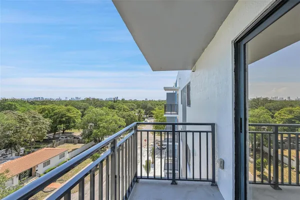 a view of a balcony with city view