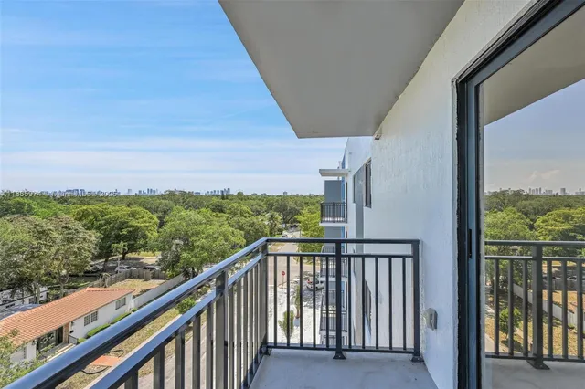 a view of a balcony with city view