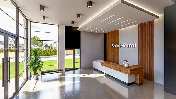 a swimming pool with outdoor seating and yard