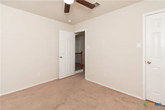 a view of a backyard of the house