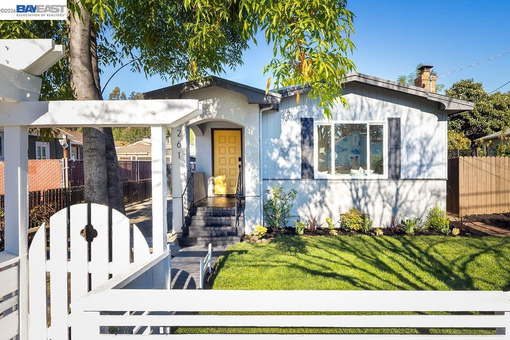 front view of a house with a yard