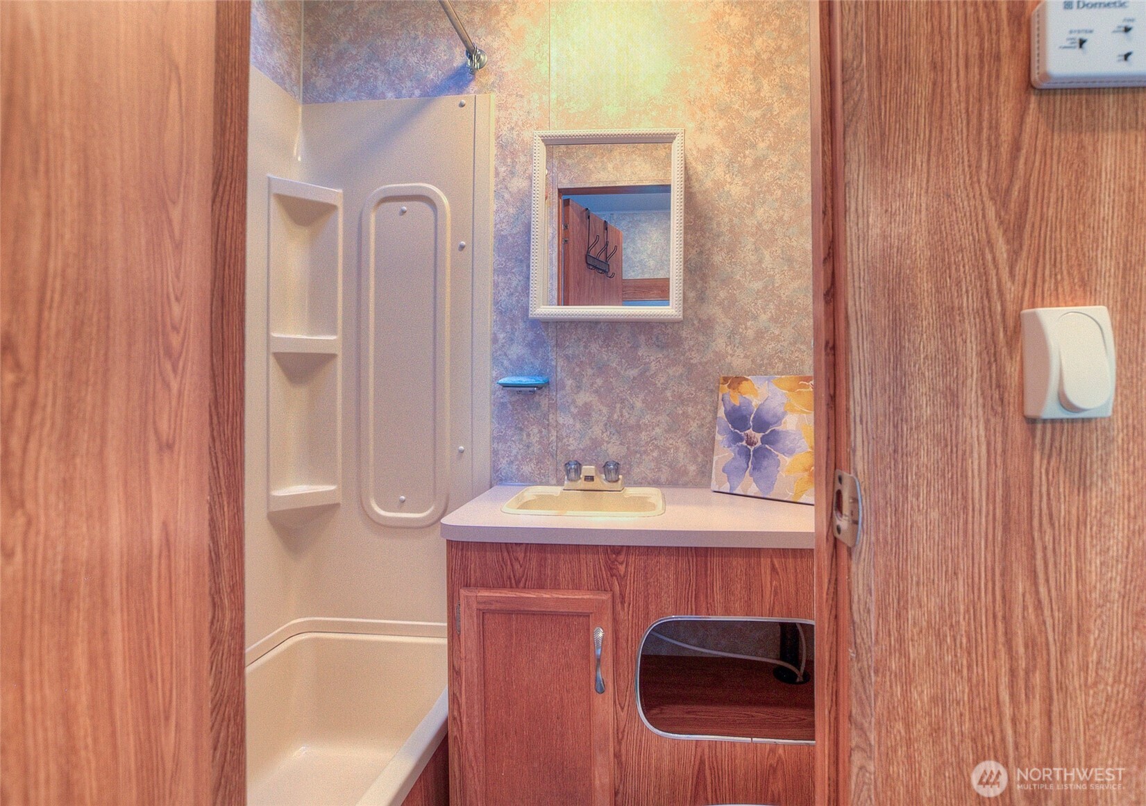 67 Frances Lane Lopez Island, WA 98261 - Photo 13 of 32 a bathroom with a sink a toilet and shower