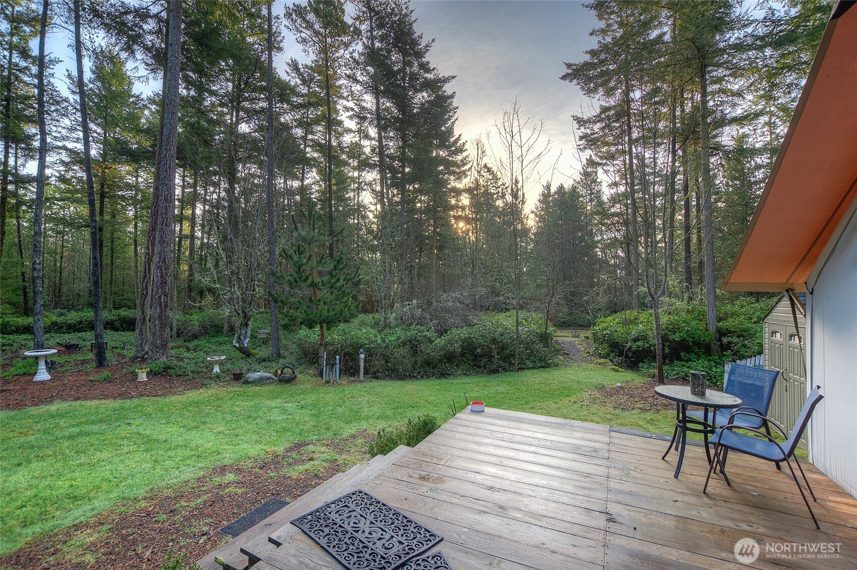 67 Frances Lane Lopez Island, WA 98261 - Photo 3 of 32 a view of a table and chairs in the garden