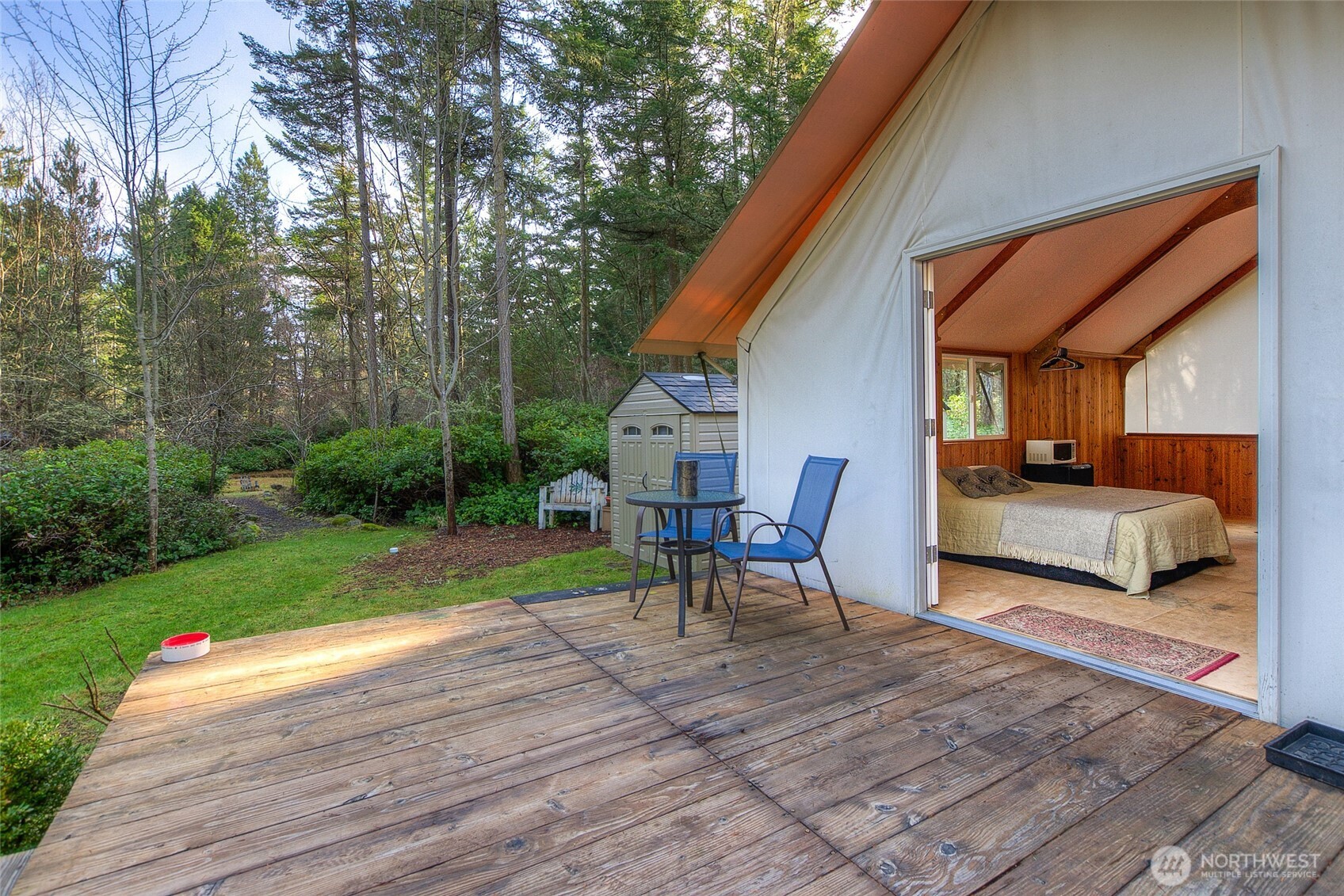 67 Frances Lane Lopez Island, WA 98261 - Photo 4 of 32 a view of a house with backyard and sitting area