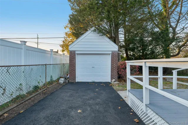 a front view of a house with a garage