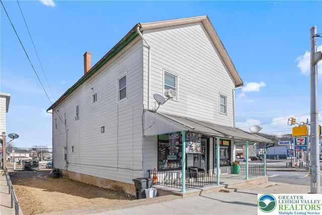 a view of a house with sitting area