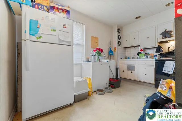 a room with furniture and a window