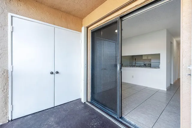 a view of a swimming pool with a yard