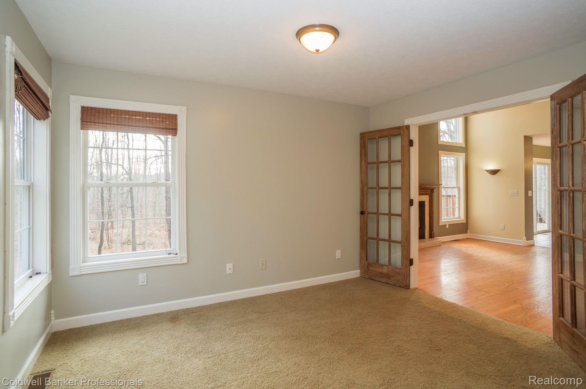 2480 Melvin Road Pinckney, MI 48169 - Photo 14 of 39 1st floor office with french doors