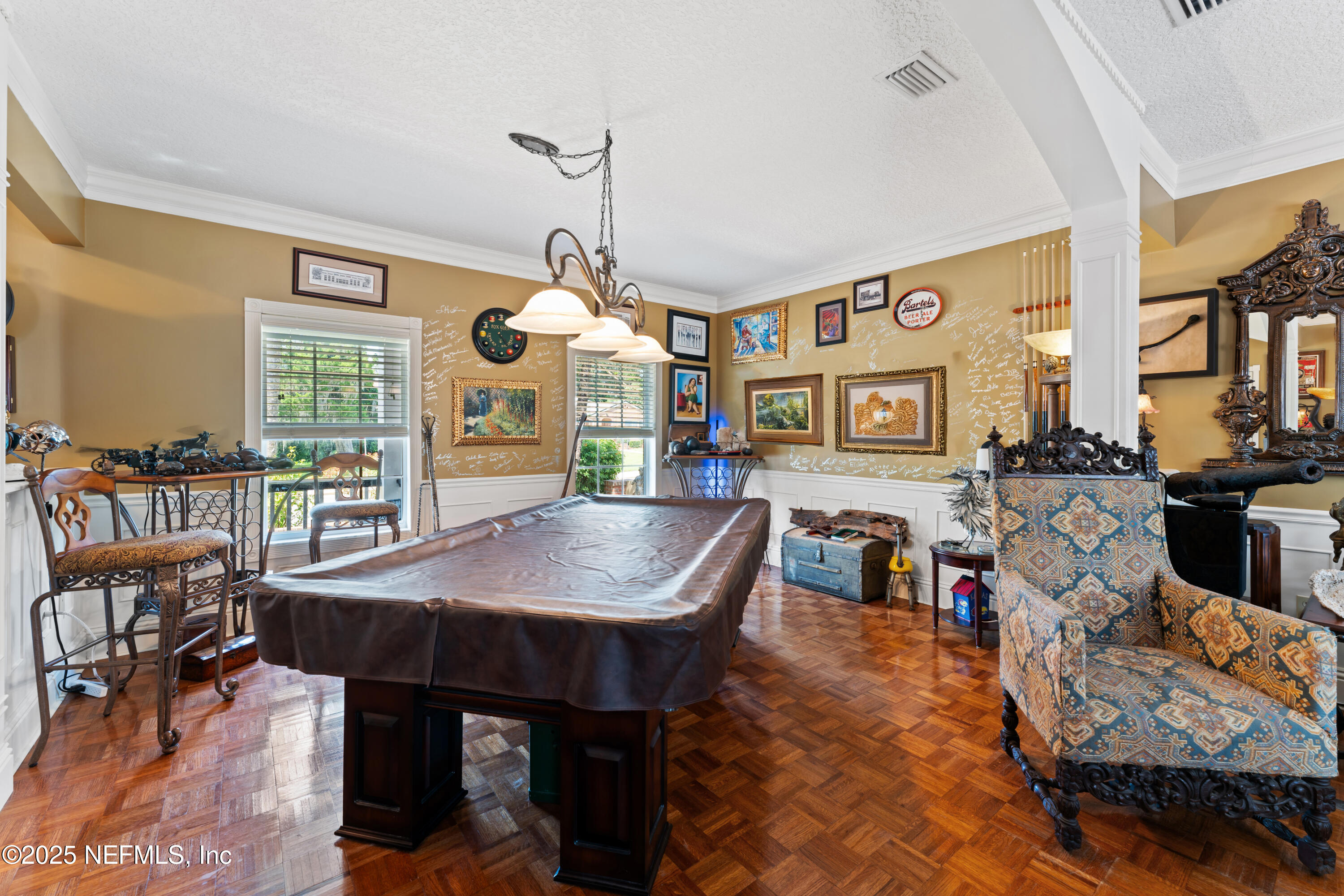 43 Valencia Street St. Augustine, FL 32084 - Photo 13 of 48 a view of a dining room with furniture and chandelier