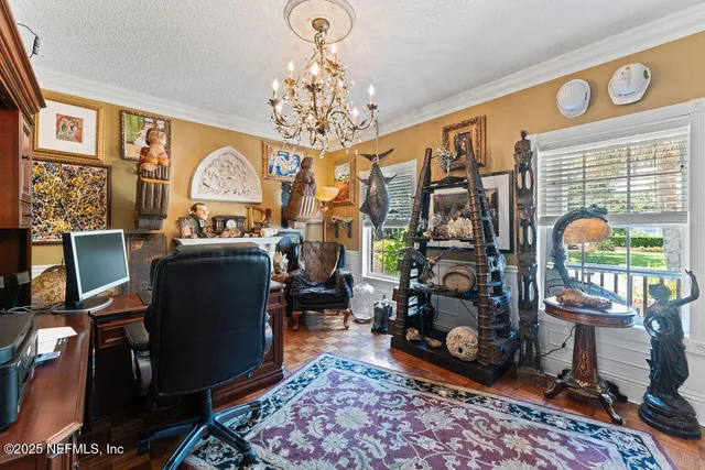 a kitchen with stainless steel appliances granite countertop a stove a sink dishwasher and microwave with wooden cabinets