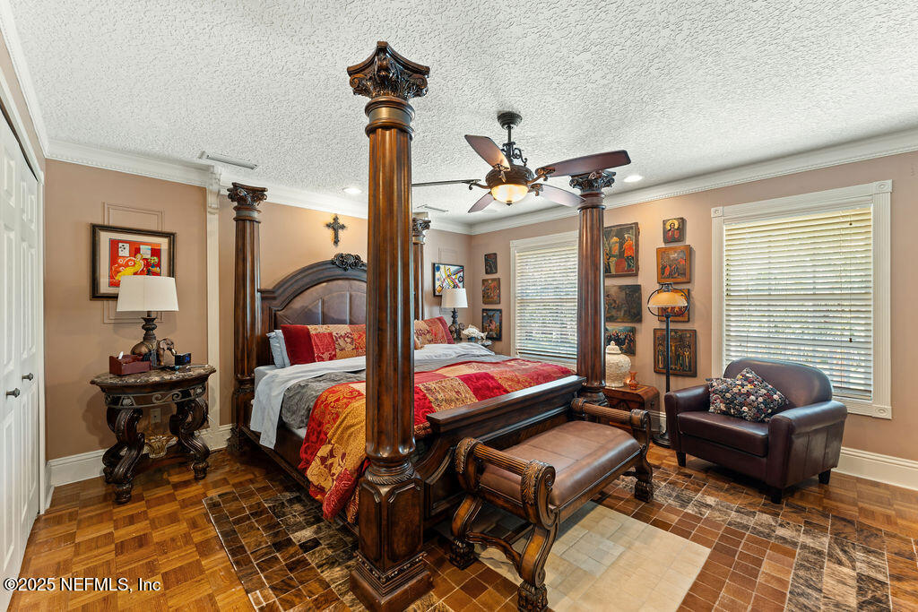 43 Valencia Street St. Augustine, FL 32084 - Photo 26 of 48 a bedroom with furniture and a bed