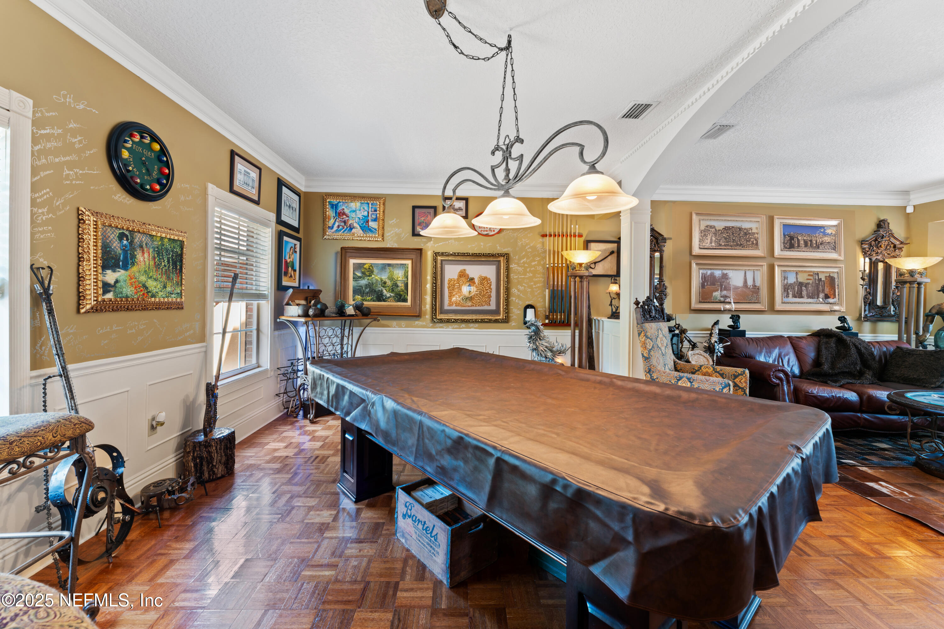 43 Valencia Street St. Augustine, FL 32084 - Photo 7 of 48 a view of a dining room with furniture and a chandelier