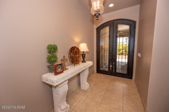 407 Camino Agua Fria Rio Rico, AZ 85648 - Photo 9 of 41 a view of hall way with mirror