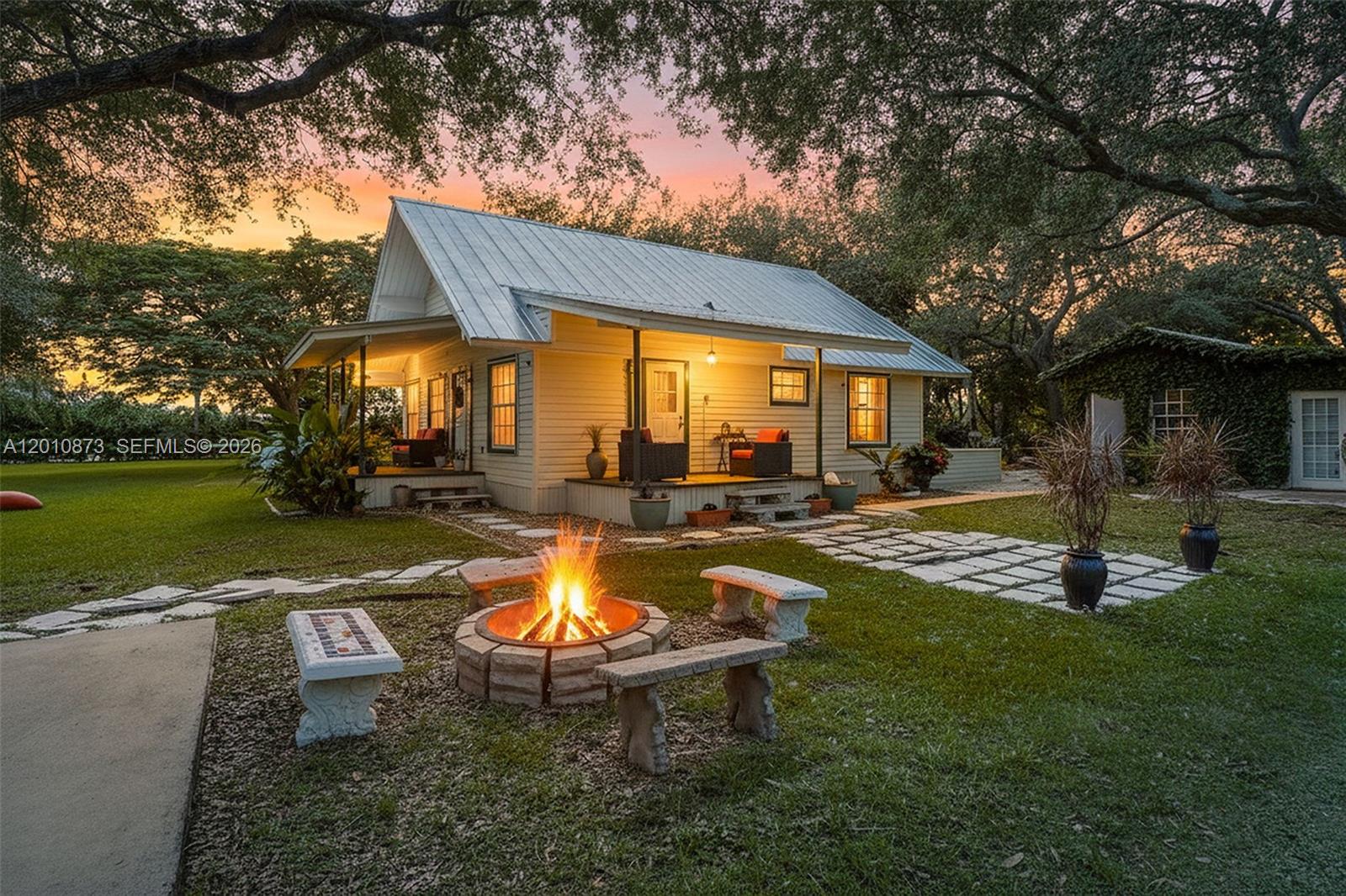 18895 Southwest 212th Street Miami, FL 33187 - Photo 2 of 32 EVENING VIEW...