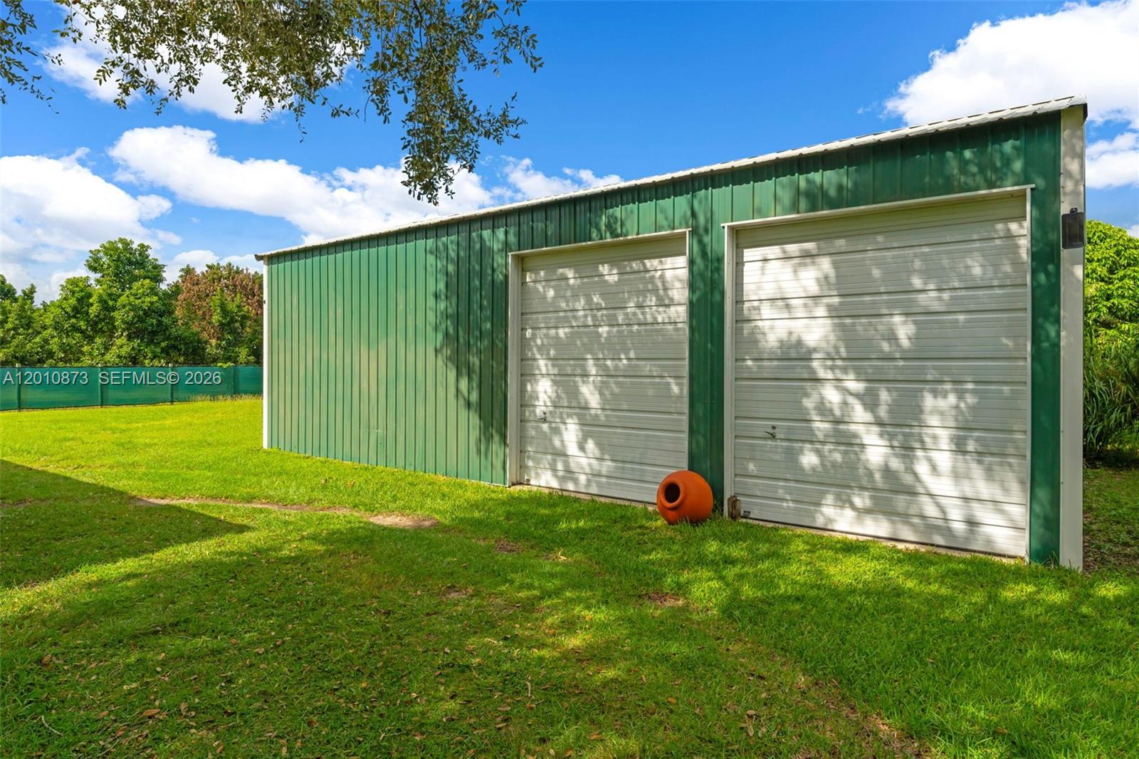 18895 Southwest 212th Street Miami, FL 33187 - Photo 29 of 32 OUTBUILDING #2 USED AS STORAGE..