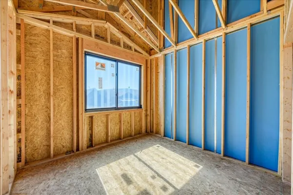 a view of front door with wooden floor