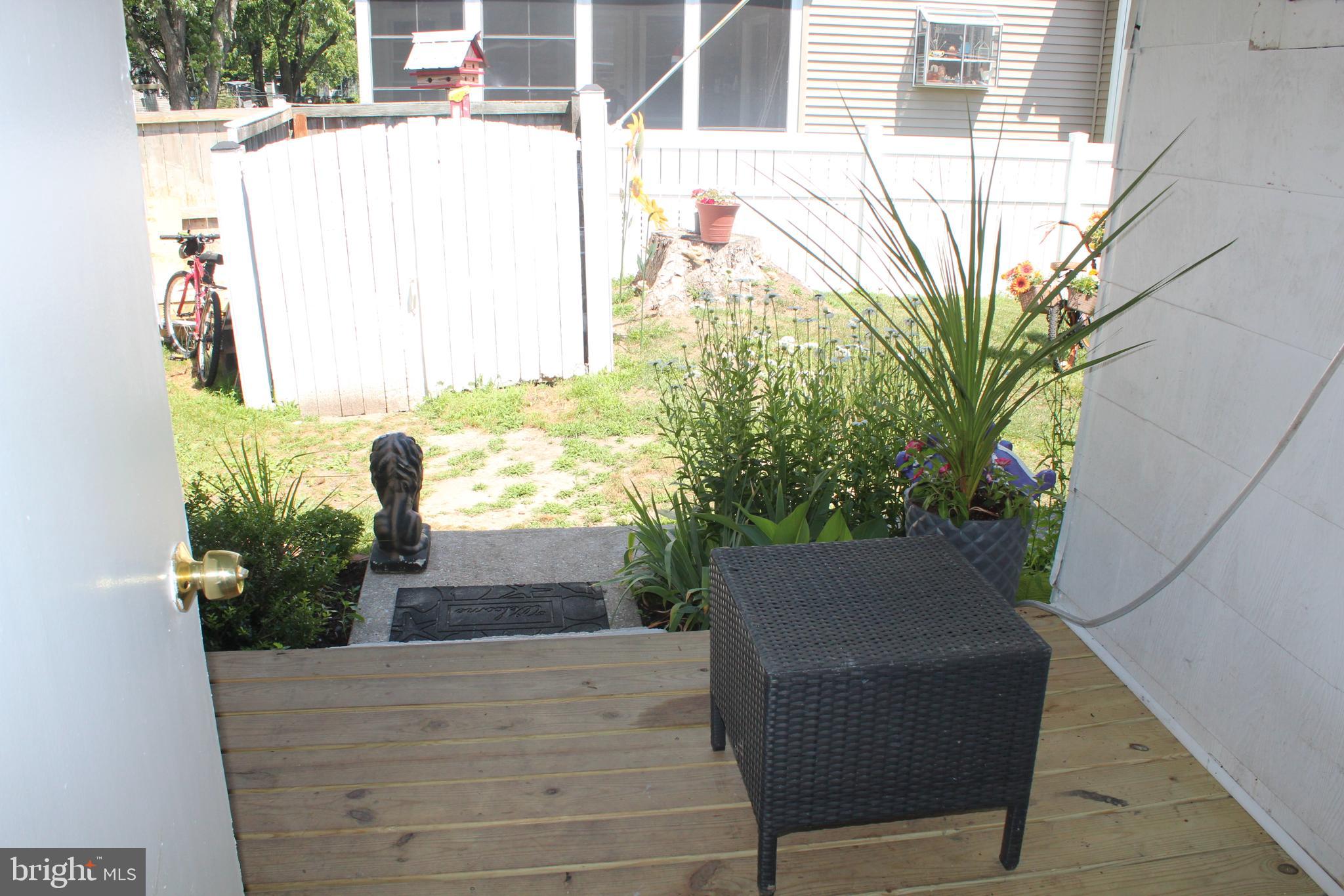 12439 West Torquay Road Ocean City, MD 21842 - Photo 19 of 24 Porch situated in between two rear entrances