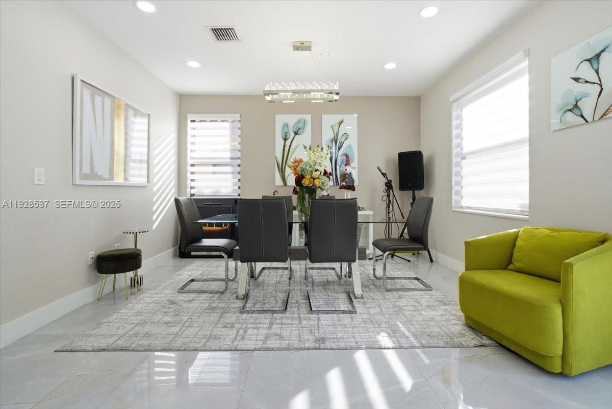 3522 West 86th Terrace Hialeah, FL 33018 - Photo 18 of 35 a view of livingroom with furniture and window