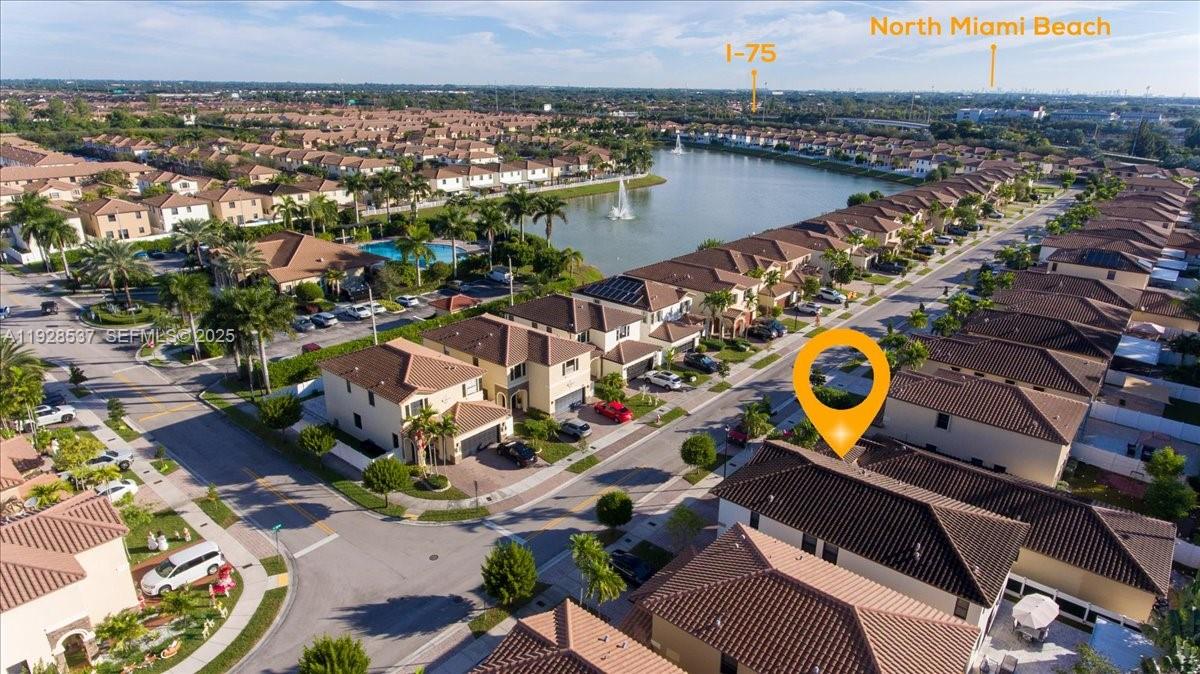 3522 West 86th Terrace Hialeah, FL 33018 - Photo 3 of 35 an aerial view of a house with a swimming pool yard and outdoor seating