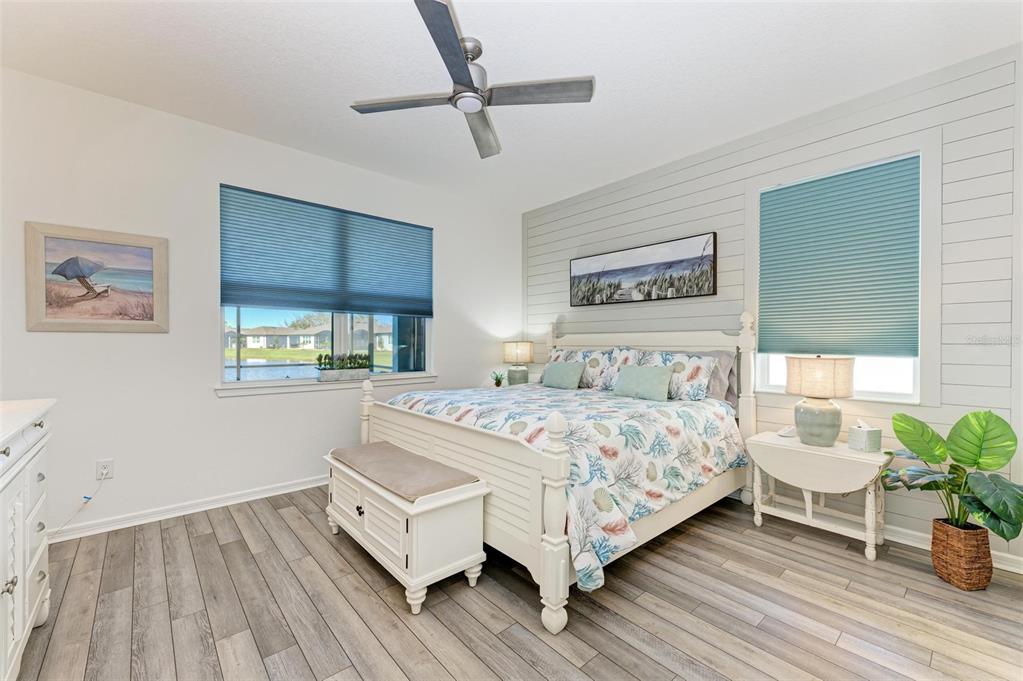 9272 Ballaster Pointe Loop Parrish, FL 34221 - Photo 22 of 79 a bedroom with a bed and a table in it