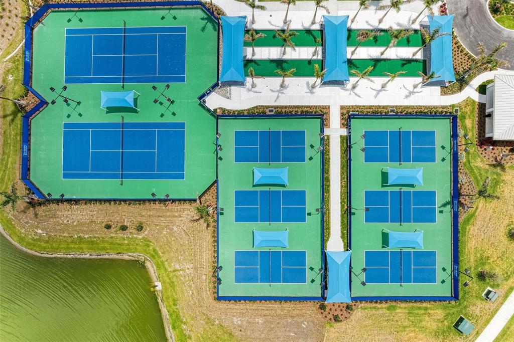 9272 Ballaster Pointe Loop Parrish, FL 34221 - Photo 46 of 79 a view of front door of house and swimming pool