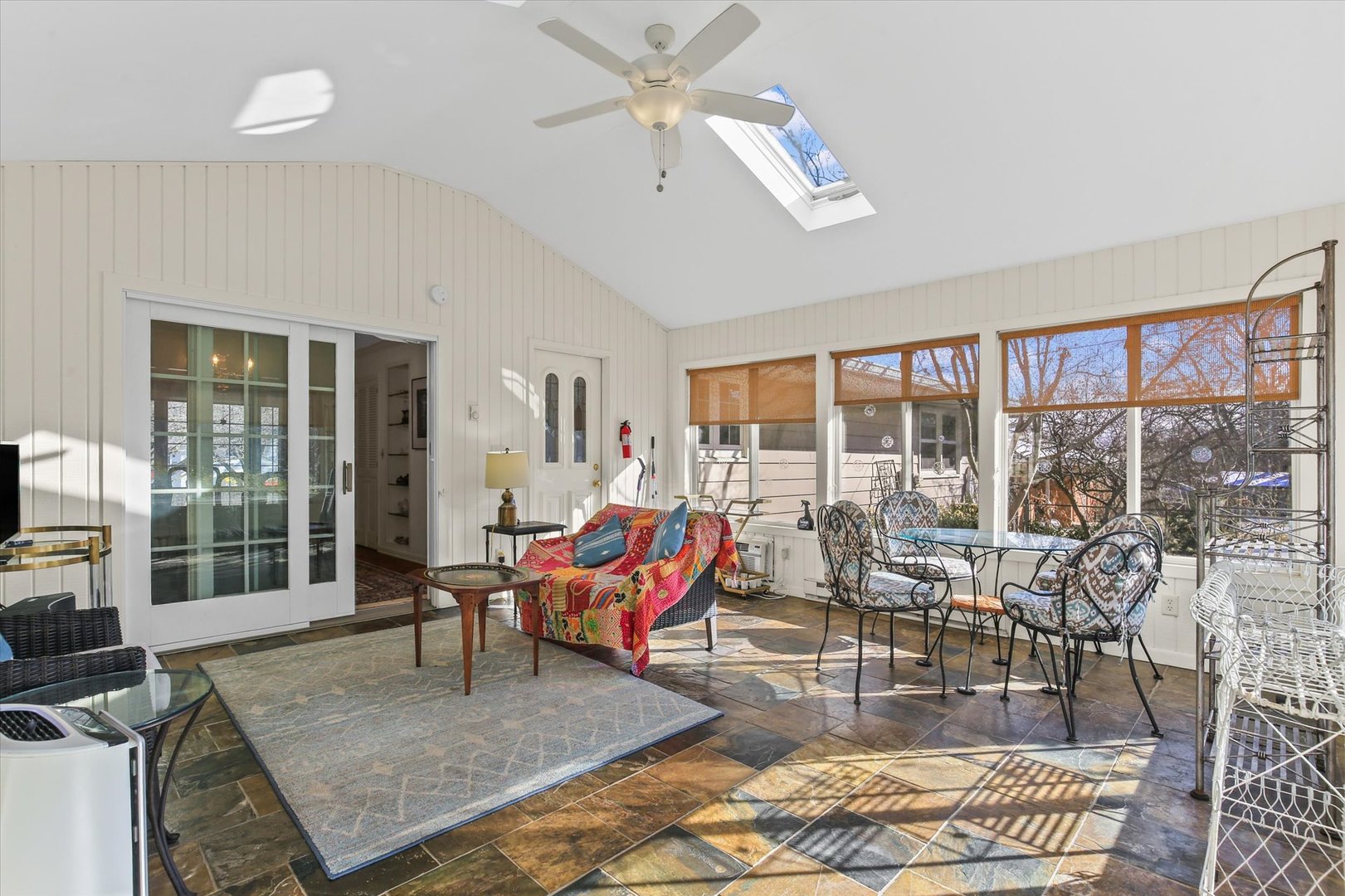201 Ellis Avenue Normal, IL 61761 - Photo 13 of 28 a living room with patio furniture and a floor to ceiling window