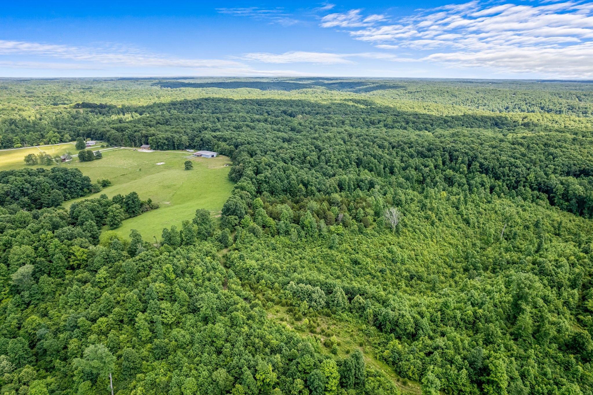 10985 Missionary Ridge Road Bon Aqua, TN 37025 - Photo 11 of 43 a view of a lake with a yard