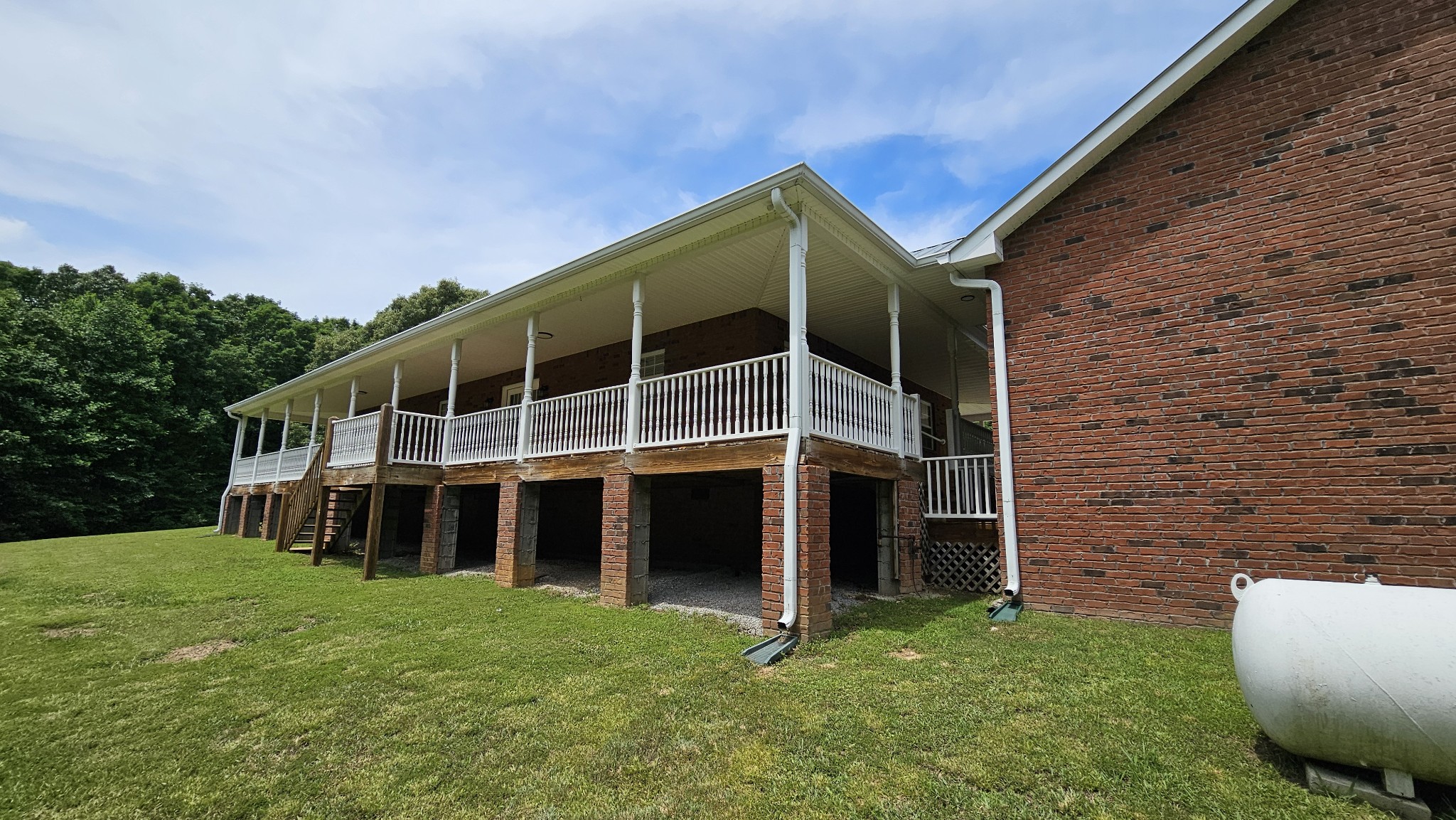 10985 Missionary Ridge Road Bon Aqua, TN 37025 - Photo 13 of 43 a view of a house with a yard