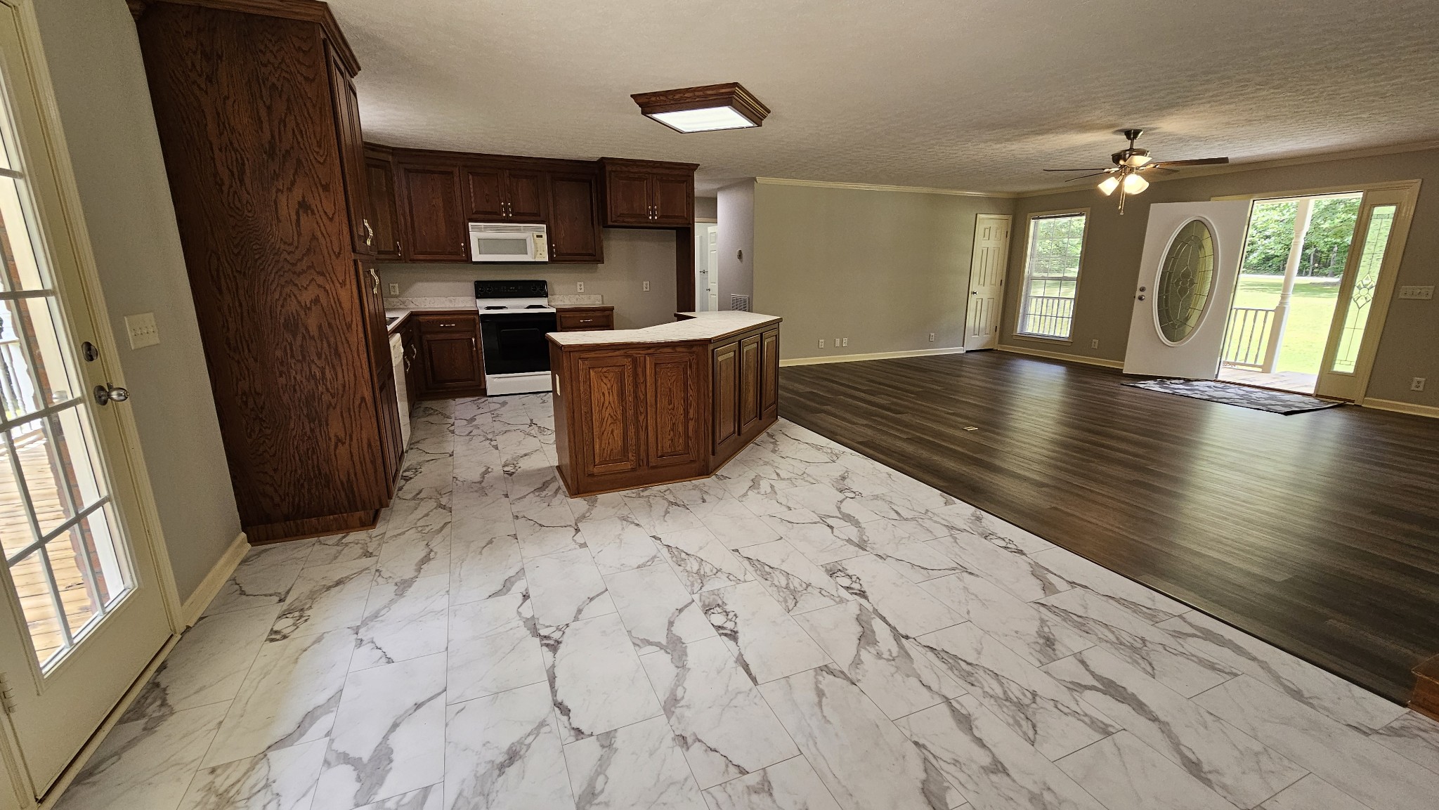 10985 Missionary Ridge Road Bon Aqua, TN 37025 - Photo 24 of 43 a view of a kitchen with a sink and cabinets