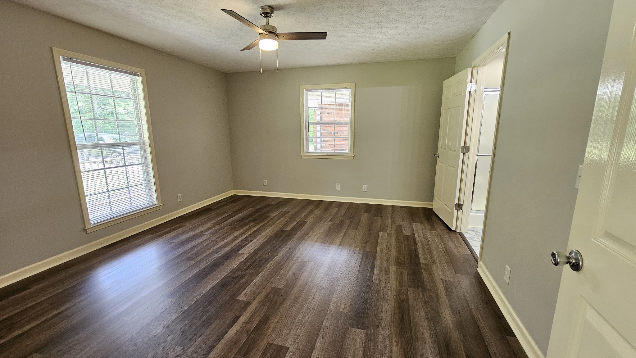 10985 Missionary Ridge Road Bon Aqua, TN 37025 - Photo 32 of 43 wooden floor in an empty room with a window