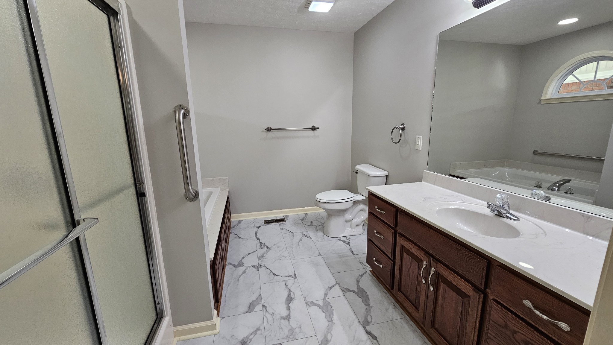 10985 Missionary Ridge Road Bon Aqua, TN 37025 - Photo 34 of 43 a bathroom with a sink a toilet and a mirror