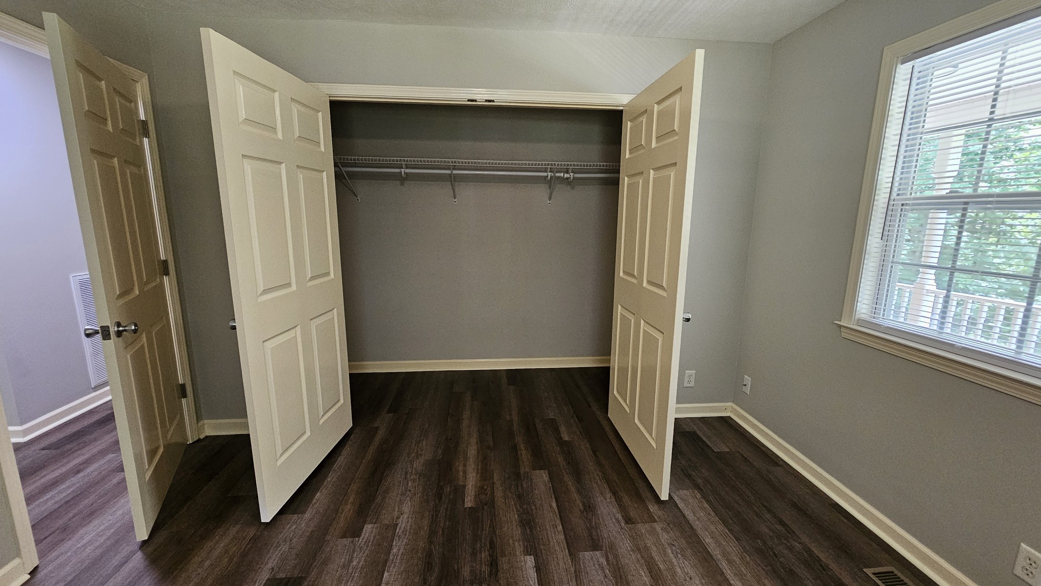 10985 Missionary Ridge Road Bon Aqua, TN 37025 - Photo 38 of 43 a view of walk in closet with wooden floor