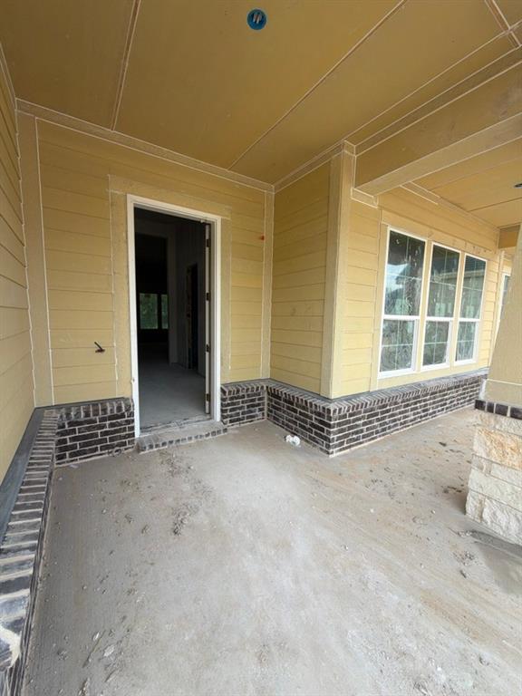 1003 Perrin Lane Van Alstyne, TX 75495 - Photo 5 of 18 an empty room with windows