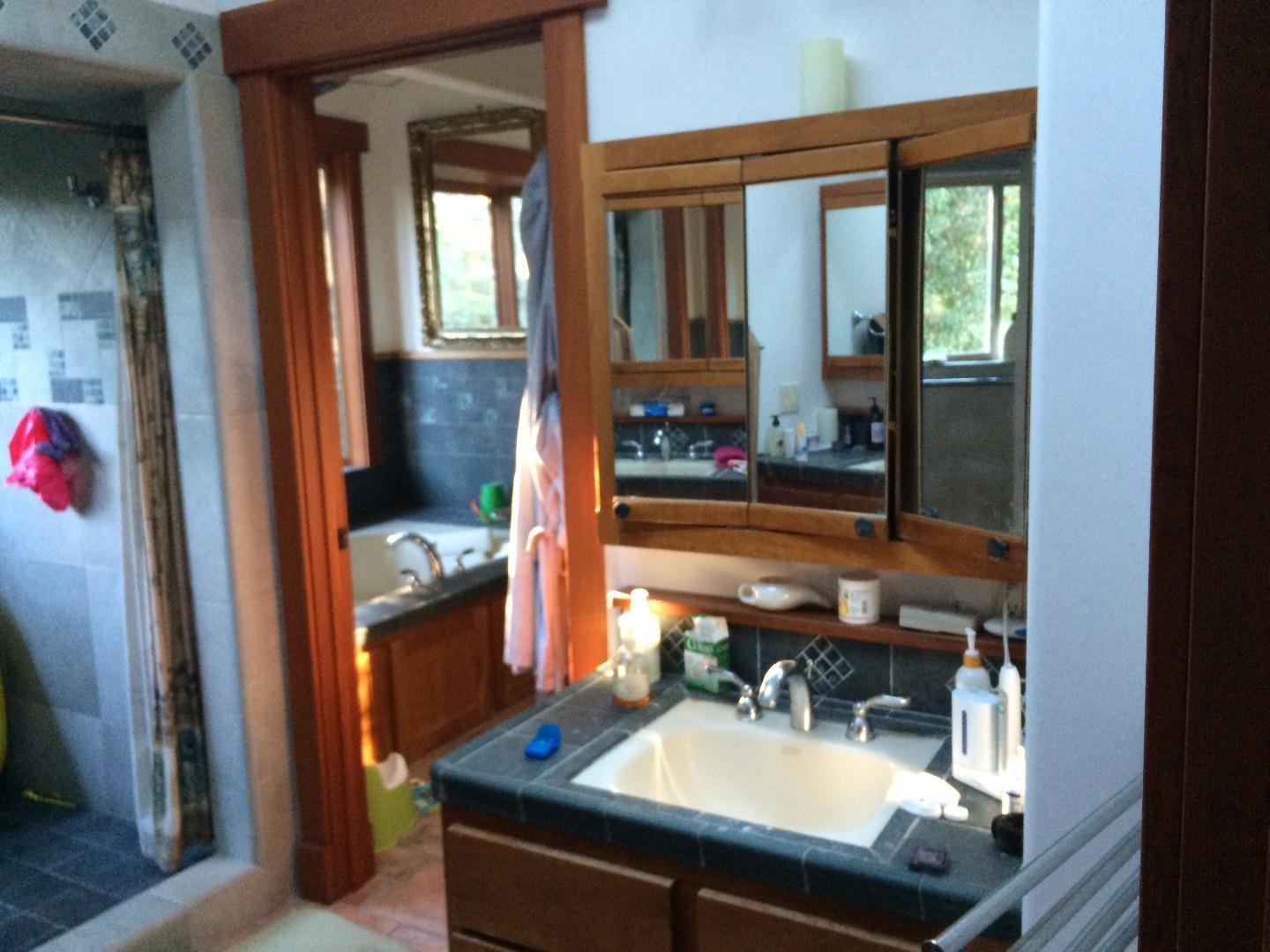 Sugarloaf Road Scotts Valley, CA 95066 - Photo 21 of 38 a room with furniture and a window